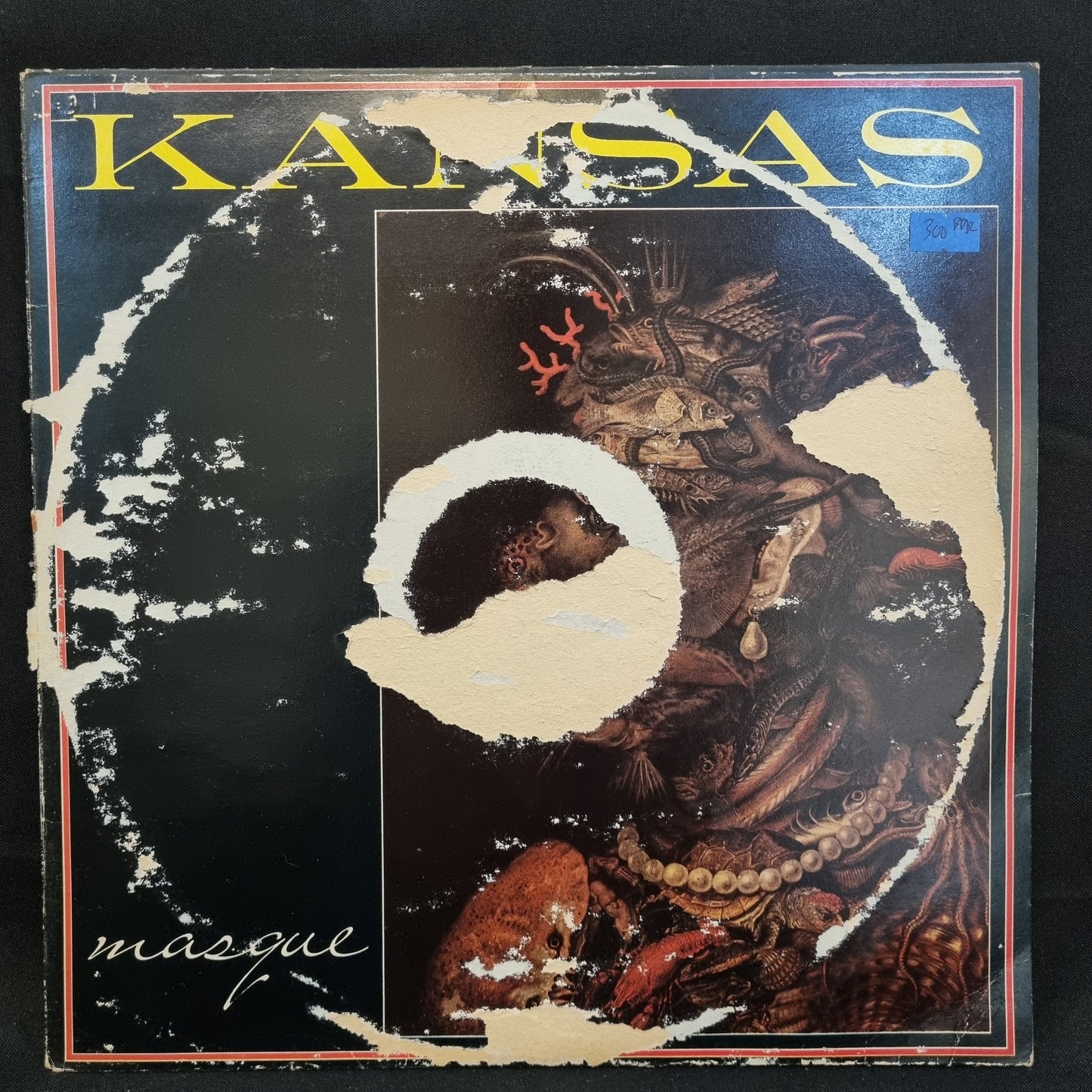 Kansas- Masque